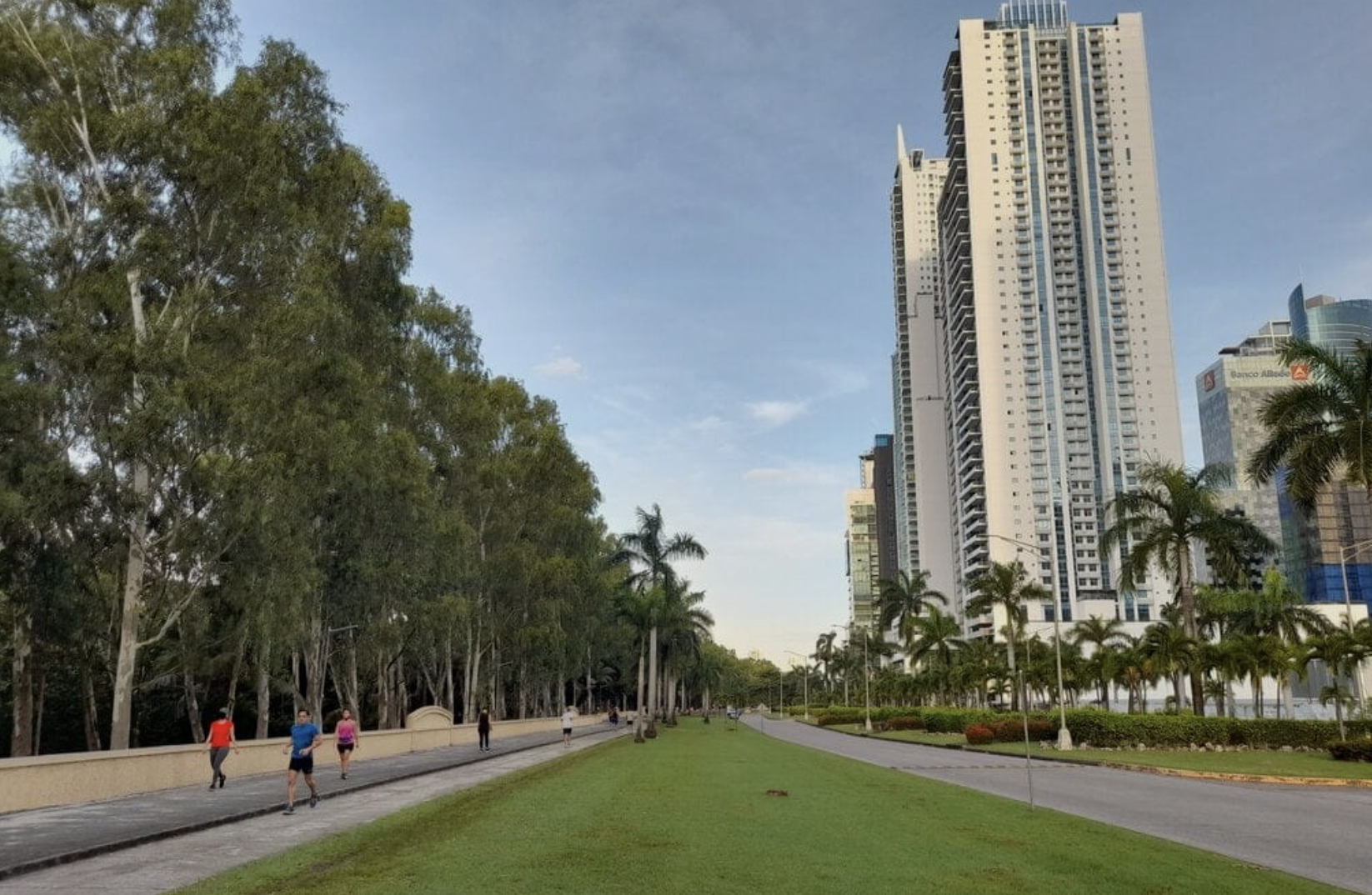 A client visit to a Panama City neighborhood, walking a residential street.